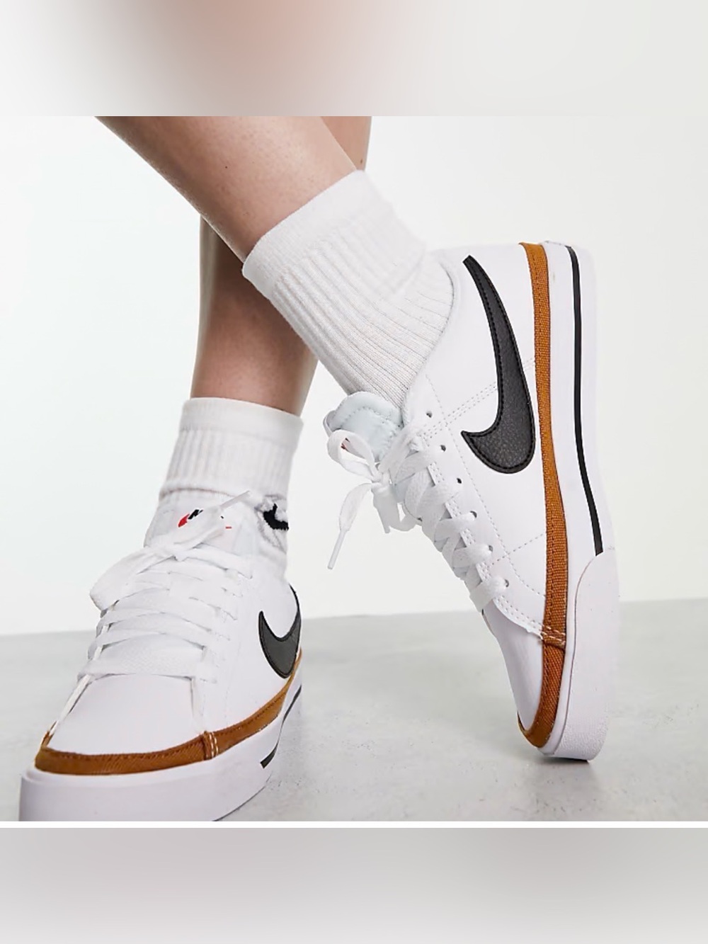 Nike court men’s White and black shoes